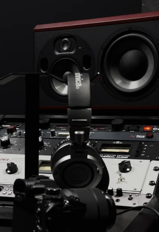 Producer creating a custom instrumental in a recording studio